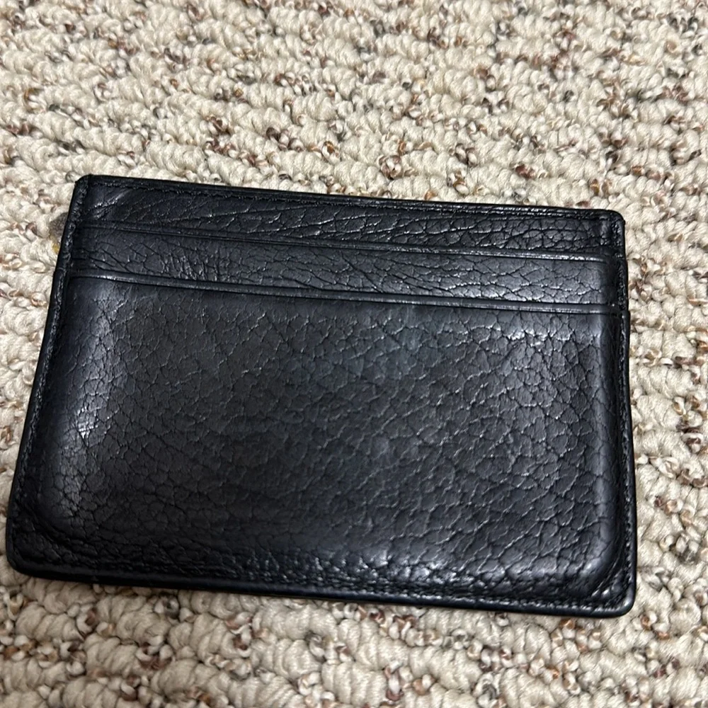Coach black leather card holder wallet.
